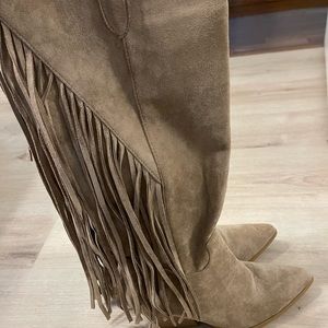 Knee high fringe boots